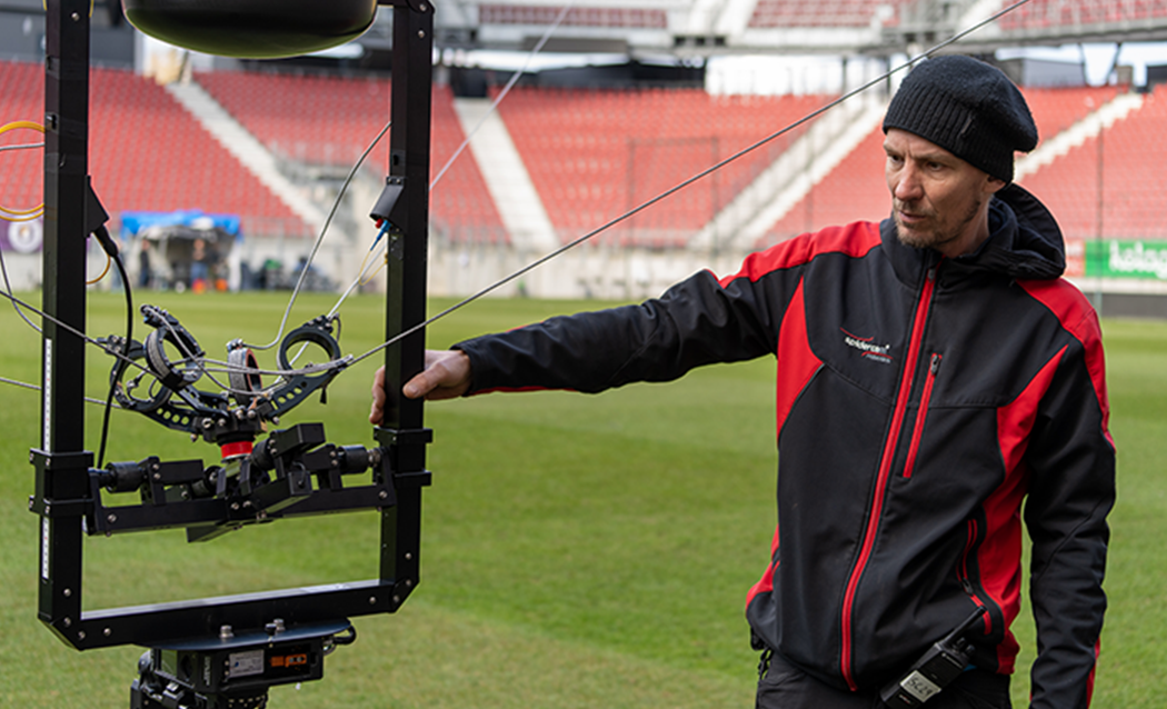 Person checking spidercam system