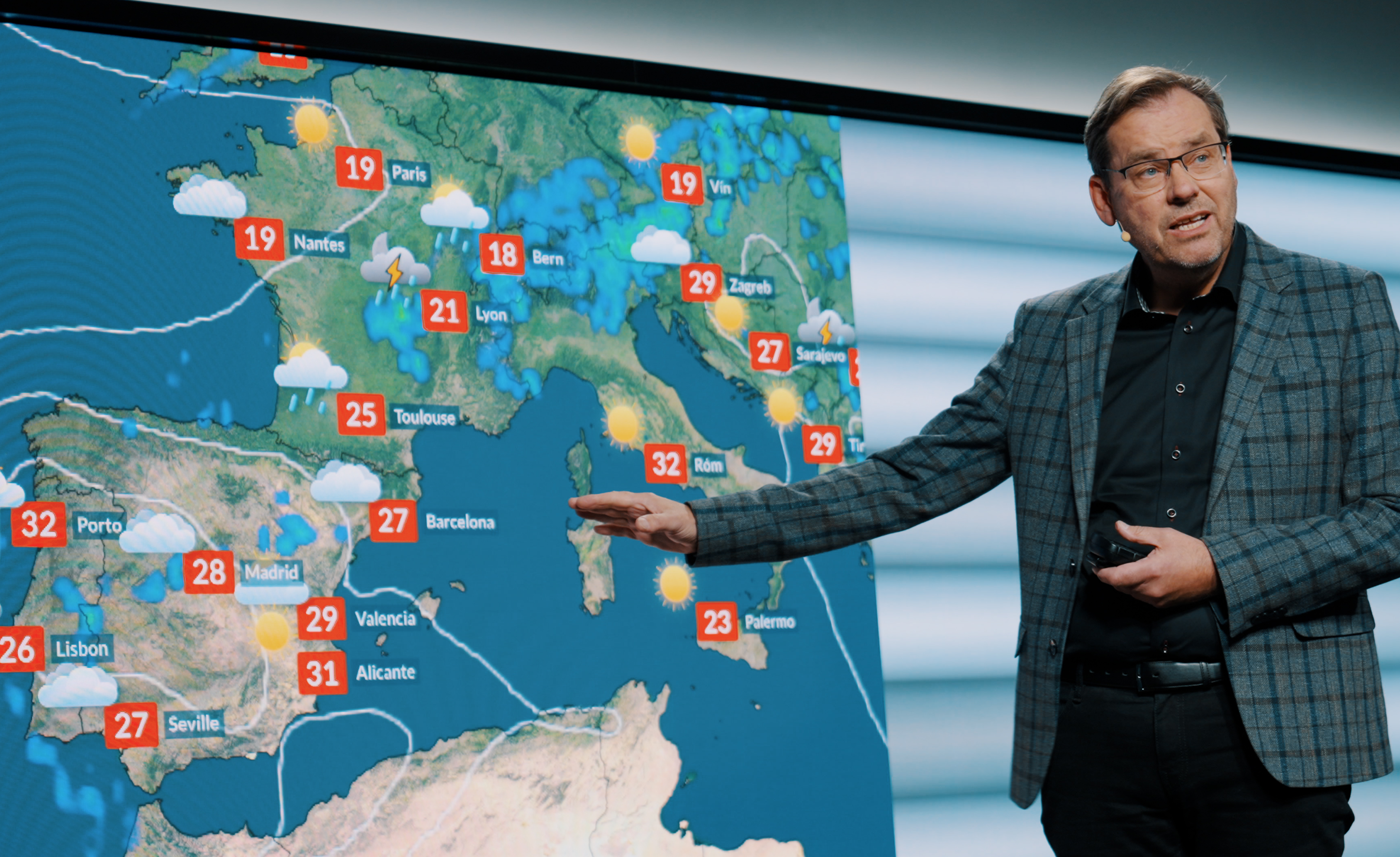 meteorologist with weather map