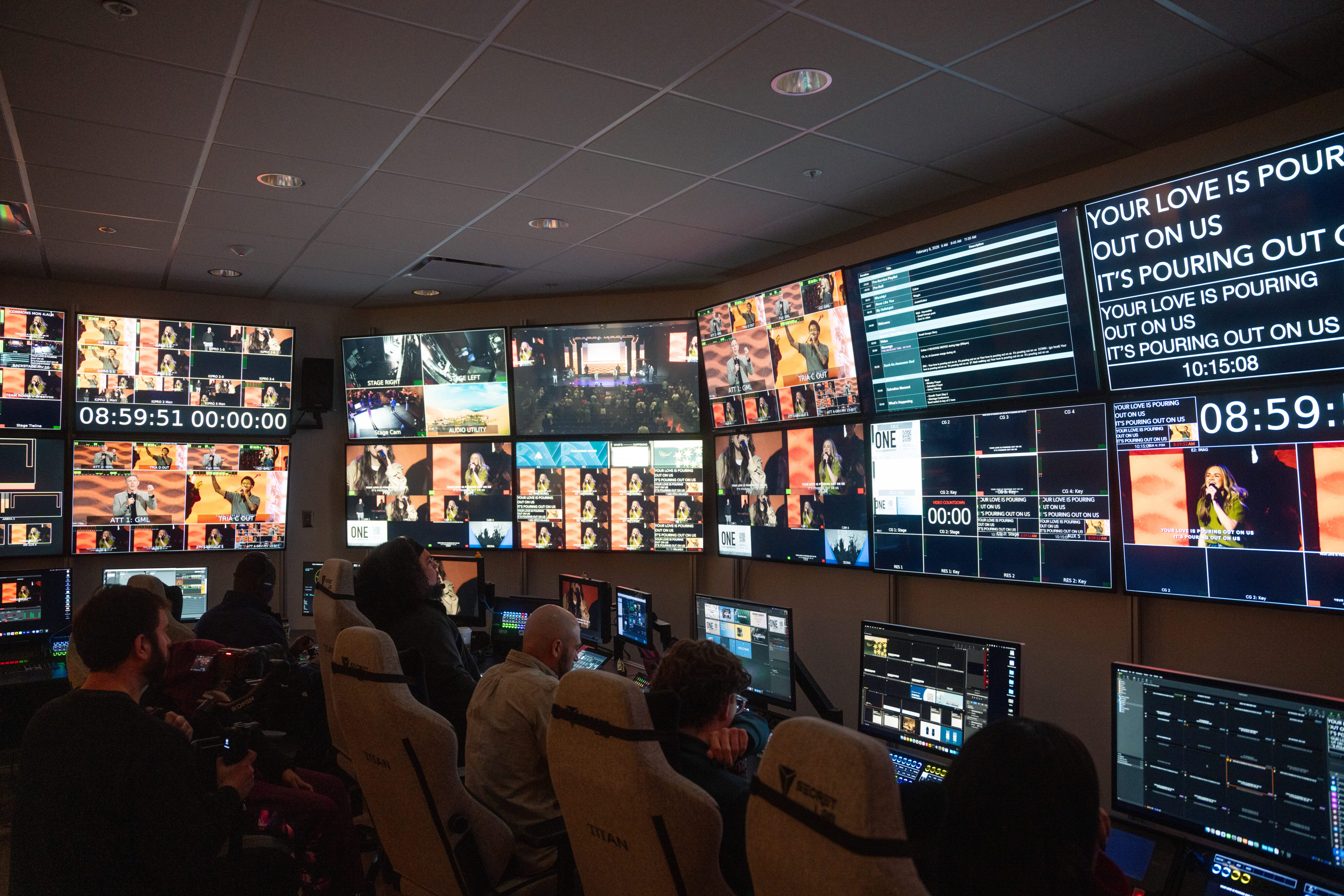Production staff working inside the Church of the Highlands control room during a live worship production.