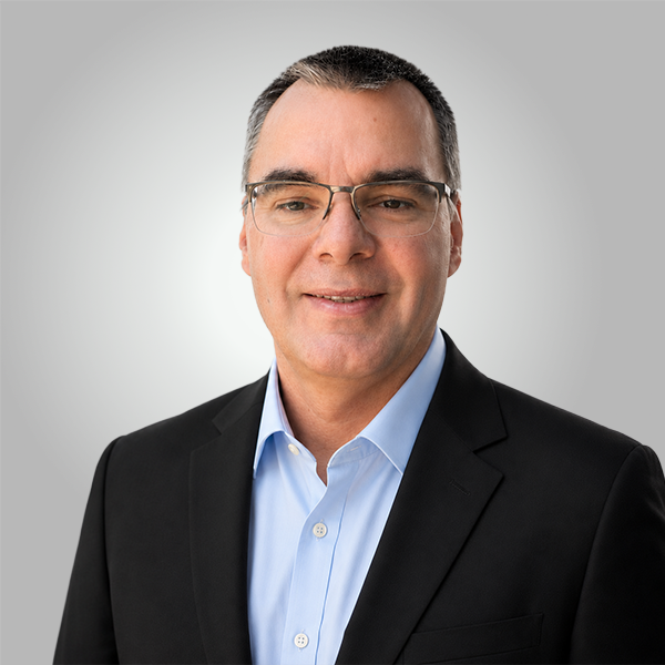 Professional headshot of Jan Huewel.